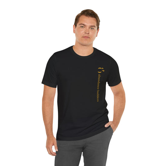 Abundance Builders Vertical Gold Logo Short Sleeve T-Shirt. Minimalist. Comfortable. Purpose-built.