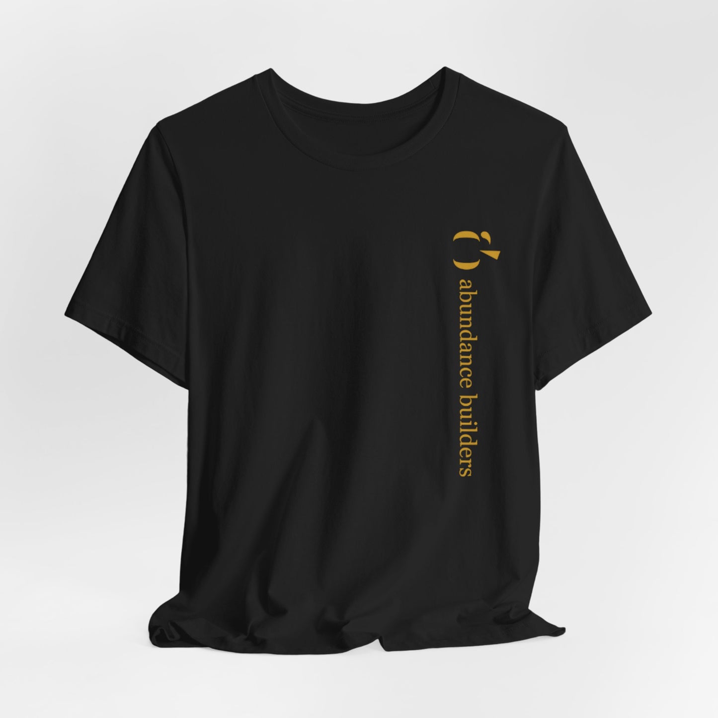 Abundance Builders Vertical Gold Logo Short Sleeve T-Shirt. Minimalist. Comfortable. Purpose-built.